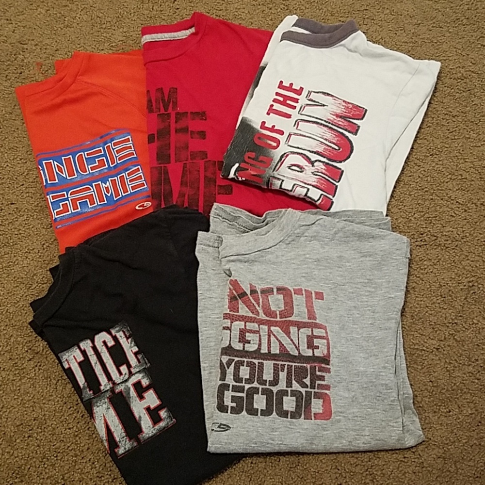 4 champion and 1 circo sports shirts